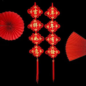 Traditional red and gold Chinese knot hangings for Lunar New Year home decor decoration.