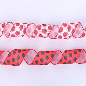 Red and black polka dot ladybug ribbon for gift wrapping and party decorations