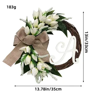 Kunstmatige witte tulpenkrans met jute strik en letter A voor huisdeur decoratie