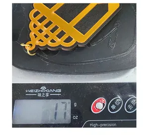 Close-up detail showing the 17g weight measurement of a wooden lantern hanging decoration
