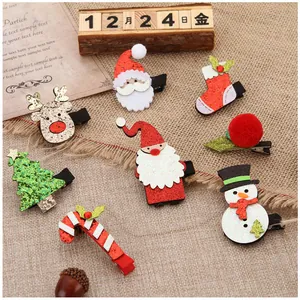 Cute Christmas hair clip set featuring Santa, reindeer and snowman designs for holiday