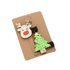 Cute glitter Christmas hair clip set with reindeer and Christmas tree designs for holiday