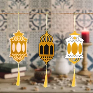 Set of three wooden Ramadan lantern ornaments with gold tassels for festival decoration