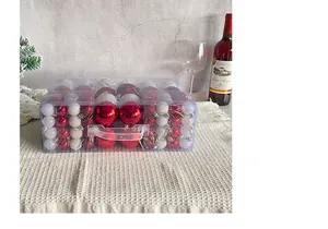 Christmas ball ornaments set with red and white baubles in a clear storage gift box