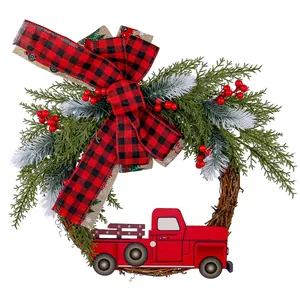 Rustic farmhouse Christmas wreath featuring a red pickup truck and buffalo plaid bow