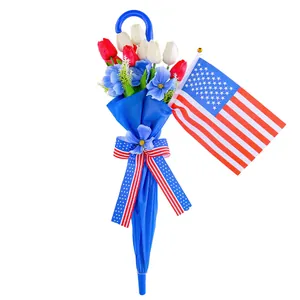 Independence Day decorative blue umbrella hanging with tulips and American flag