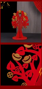 Close-up of wooden Chinese New Year money tree with red and gold glittery ingot details