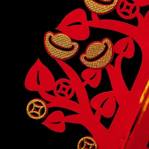 Traditional Chinese New Year gold yuanbao and red money tree decoration