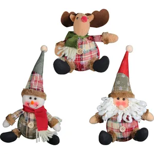 Three adorable Christmas plaid plush dolls including snowman and reindeer ornaments