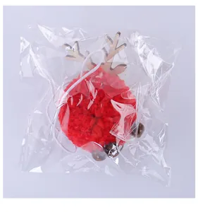 Decorazione natalizia a forma di renna con pompon rosso in confezione di plastica trasparente