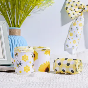 Bee festival themed faux burlap ribbons with sunflower and gingham patterns for DIY decor