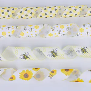 Assorted yellow bee festival burlap ribbons with sunflower, honeycomb and polka dot patterns
