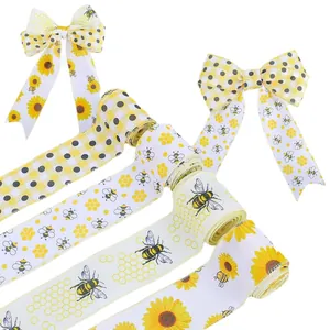 Decorative bumblebee and sunflower patterned faux burlap ribbons for Bee Day party decor