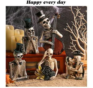 Vue détaillée de figurines de squelettes d'Halloween en résine aux poses variées
