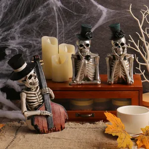 Ensemble de figurines squelettes d'Halloween avec violoncelliste et crânes en résine