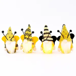 Set of four decorative glowing Bee Festival gnomes with plush wings and LED beards