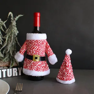 Festive knitted Christmas wine bottle cover set featuring red sweater and Santa hat