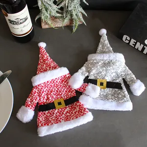 Knit Christmas wine bottle covers in Santa outfit design for holiday table decor