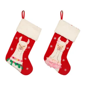 Two red Christmas stockings with cute alpaca embroidery and white plush cuffs.