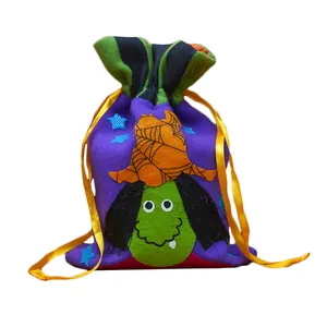 Halloween drawstring gift bag featuring cartoon witch design made of soft purple flannel