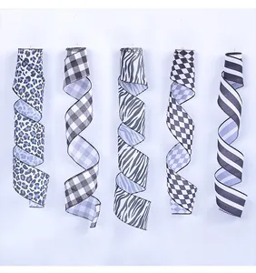Collection of decorative ribbons with leopard, gingham, zebra, and checkered patterns.