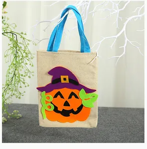 Sacchetto regalo per Halloween in juta con simpatica zucca e cappello da strega applicati