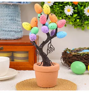 Artificial Easter egg bonsai tree decoration featuring vibrant speckled eggs in a clay pot