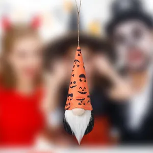 Detailed view of Halloween gnome hanging ornament with orange pumpkin patterned hat.