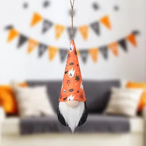 Close-up of a Halloween gnome hanging ornament with ghost and spider patterns