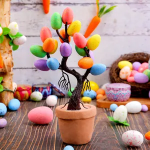 Decorative Easter egg tree bonsai with colorful speckled eggs for holiday atmosphere