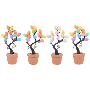 Set of four colorful Easter egg tree bonsai decorations featuring creative speckled egg designs