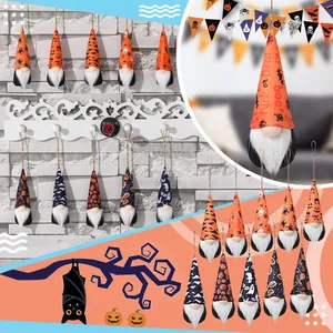 Detailed macro view showing diverse Halloween faceless gnome hanging decorations with text