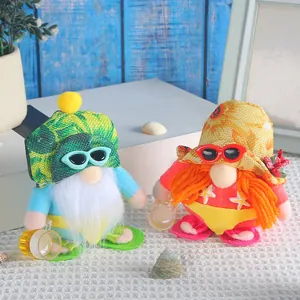 Pair of cute beach gnomes with sunglasses and bikinis for summer seaside home decor