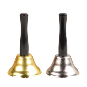 Set of gold and silver Christmas hand bells with black wooden handles for service calling