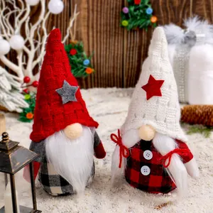 Set of two handmade Christmas gnomes with knitted star hats and plaid bodies