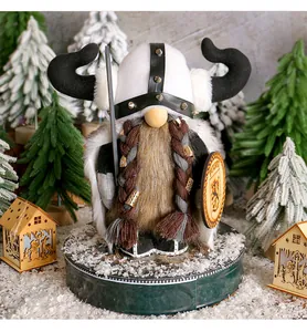 Detailed view of handcrafted Viking gnome figurine featuring braided beard and shield
