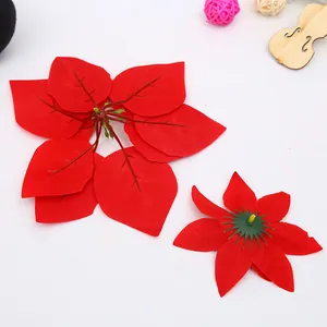 Vibrant red velvet artificial poinsettia flowers for Christmas home decor and bouquets.