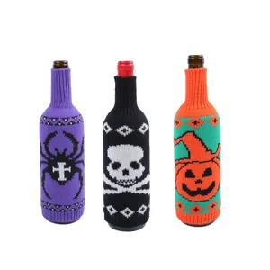 Halloween knitted wine bottle covers with spider skull and pumpkin designs for holiday decor