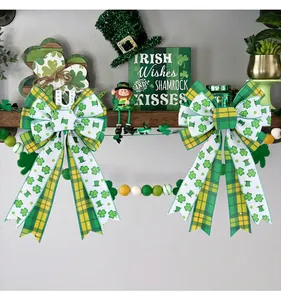 Festive St. Patrick's Day bows with shamrock and green plaid patterns on a shelf