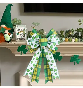 Decorative St. Patrick's Day bow with shamrock patterns on a fireplace mantel