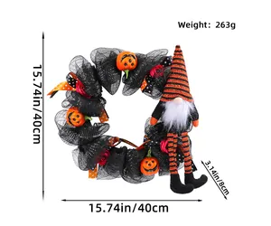 Halloween wreath featuring long-legged gnome with orange hat and pumpkin decorations