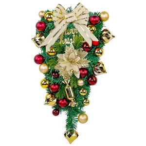 Artificial Christmas teardrop swag with red and gold ornaments for holiday wall decor