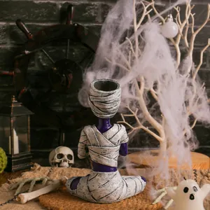 Creative Halloween mummy resin ornament in a meditating pose for spooky desktop decor