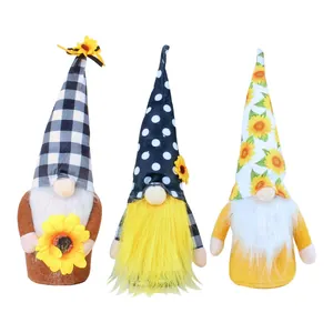Set of three sunflower plush gnomes with patterned hats for home and window decoration.