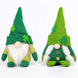 Set of two plush St. Patrick's Day gnomes featuring green hats and clover decorations