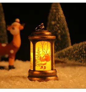 Warm vintage Christmas lantern light featuring a Santa Claus graphic on snowy ground