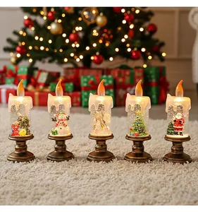 Detailed macro view of five Christmas LED candles with festive snow globe figurines.