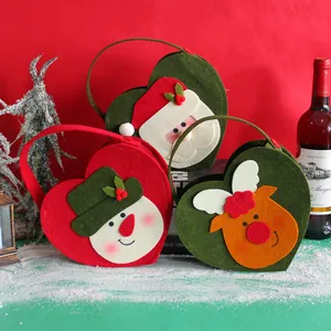 Festive heart-shaped felt Christmas gift bags featuring Santa, Snowman and Reindeer designs