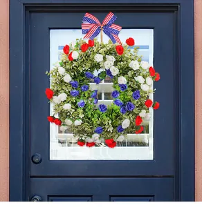 Close-up detail of patriotic Independence Day wreath with red white and blue flowers