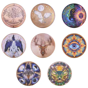 Set of eight shamanic drums with mystical animal and celestial designs for percussion